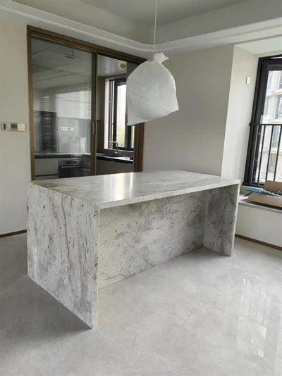 Taulells de granit blanc Andròmeda